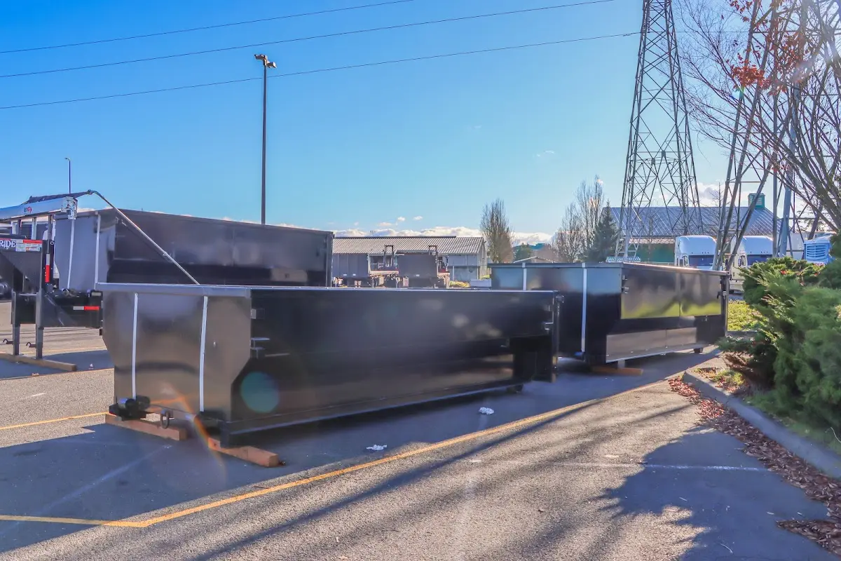 Roll-off dumpster ready for waste disposal at job site for 3 Yard Dumpster Rental in Marshall